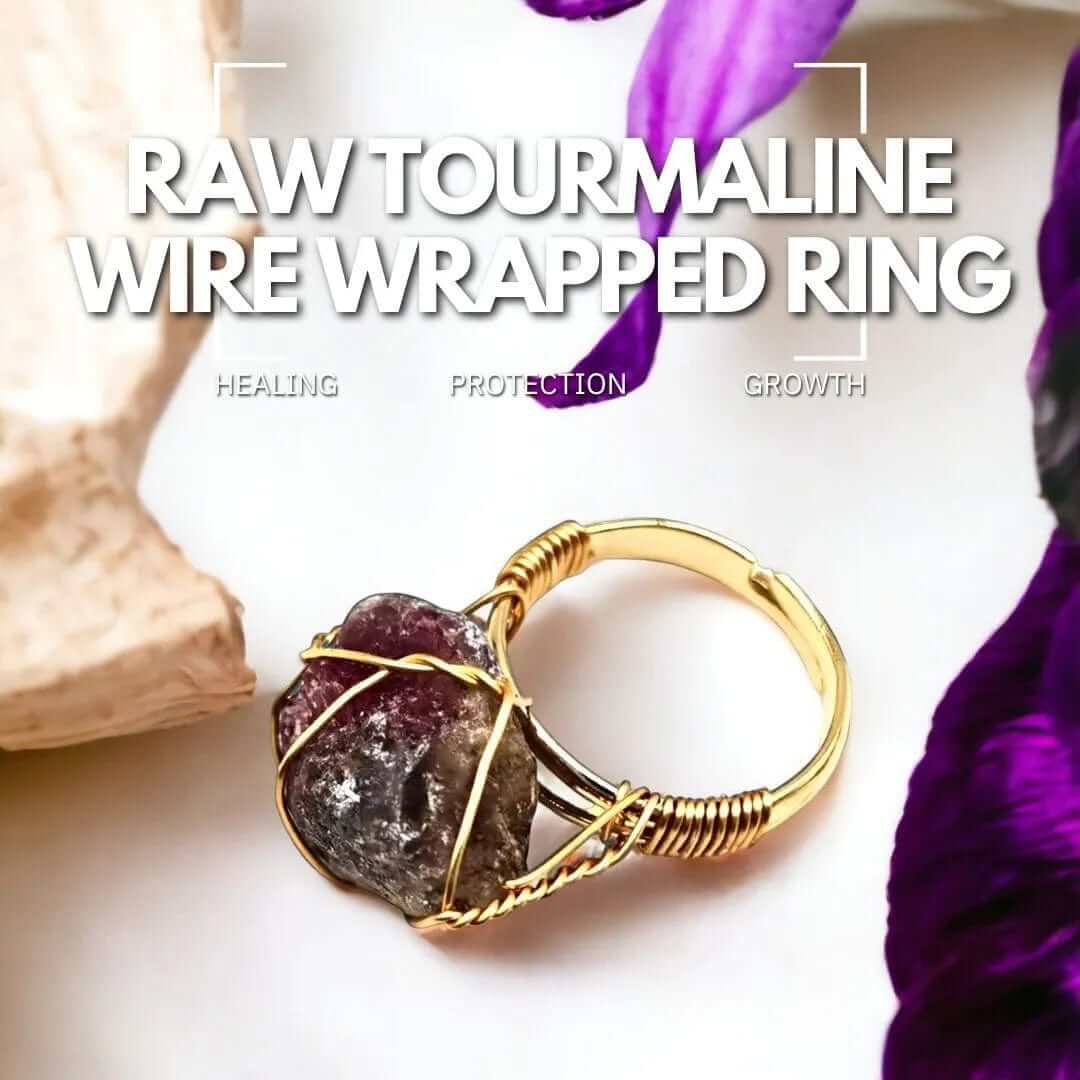 Raw tourmaline wire wrapped ring - a black tourmaline crystal wrapped in silver wire on a ring band.