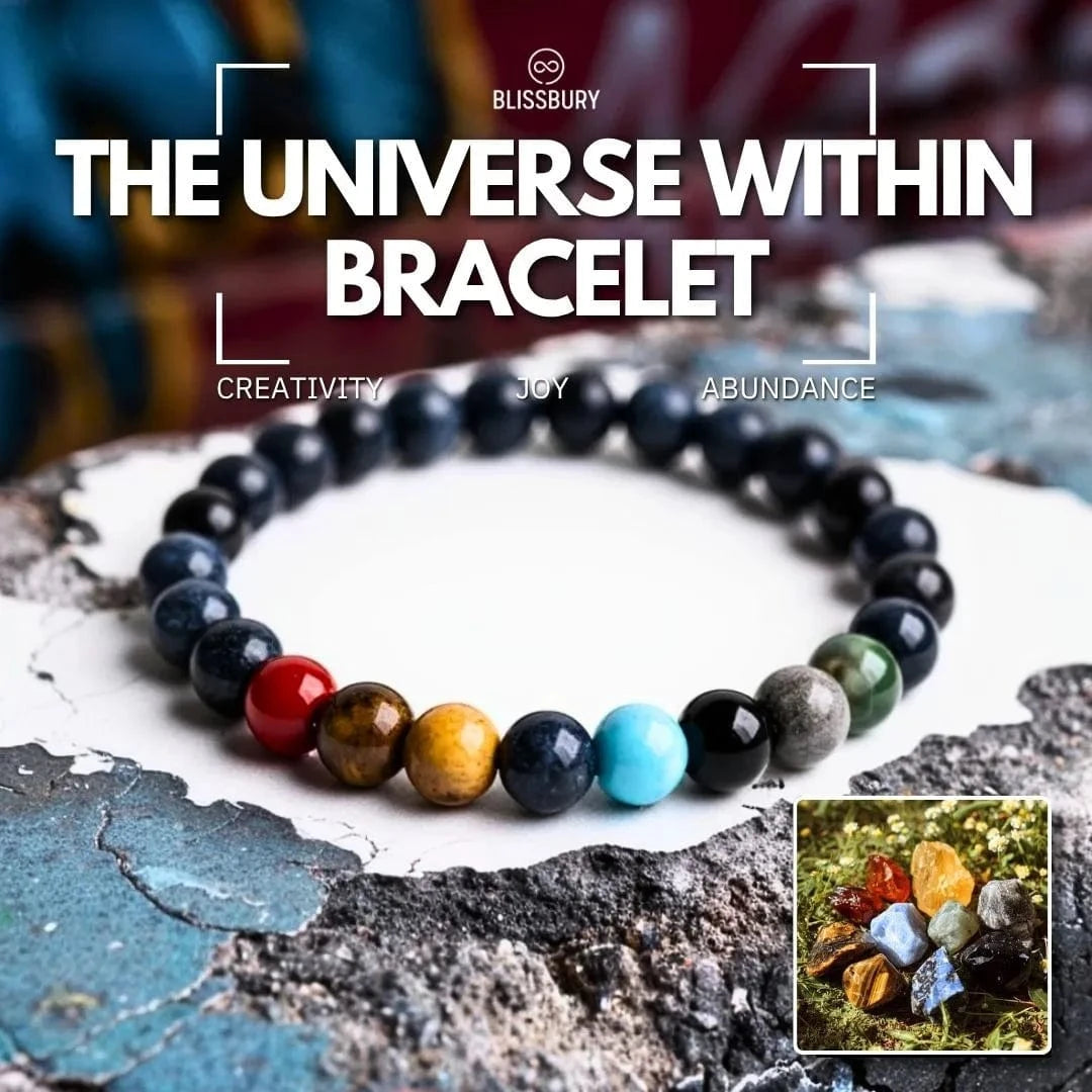 The Universe Within Bracelet: Creativity, Joy, Abundance. Silver charm bracelet with celestial charms.